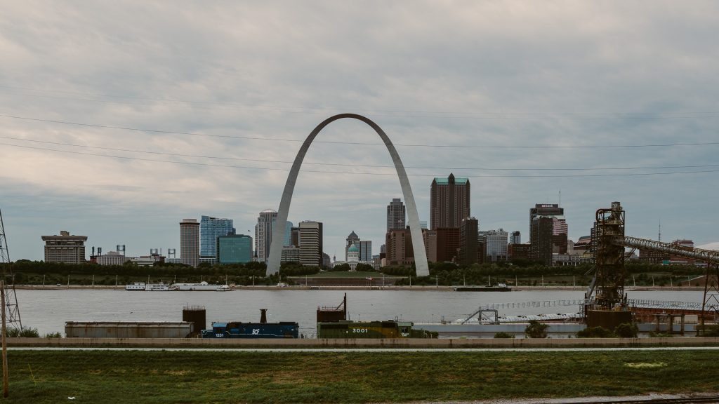 St. Louis Arch towering majestically against a clear sky.