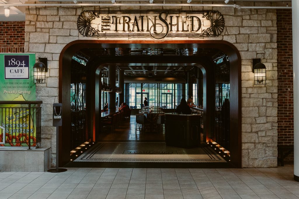 Train shed showcasing vintage trains and railway heritage.