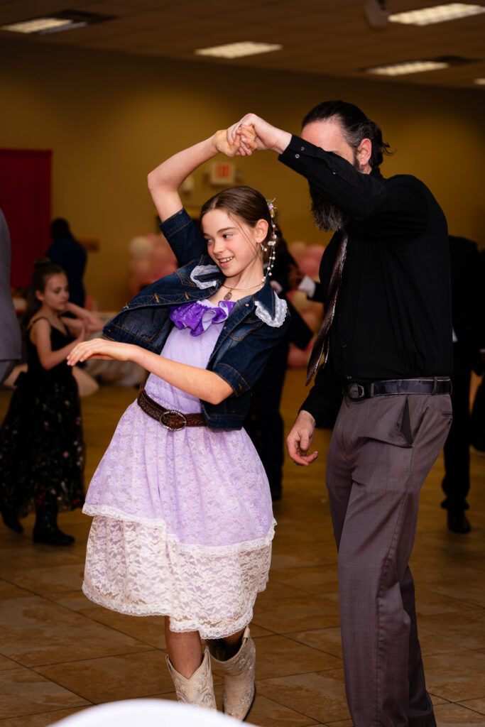 Heartwarming father-daughter dance captured during a special celebration.