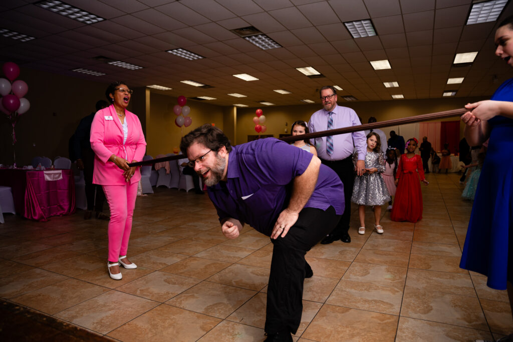 Heartwarming father-daughter dance capturing special moments at a joyful celebration.