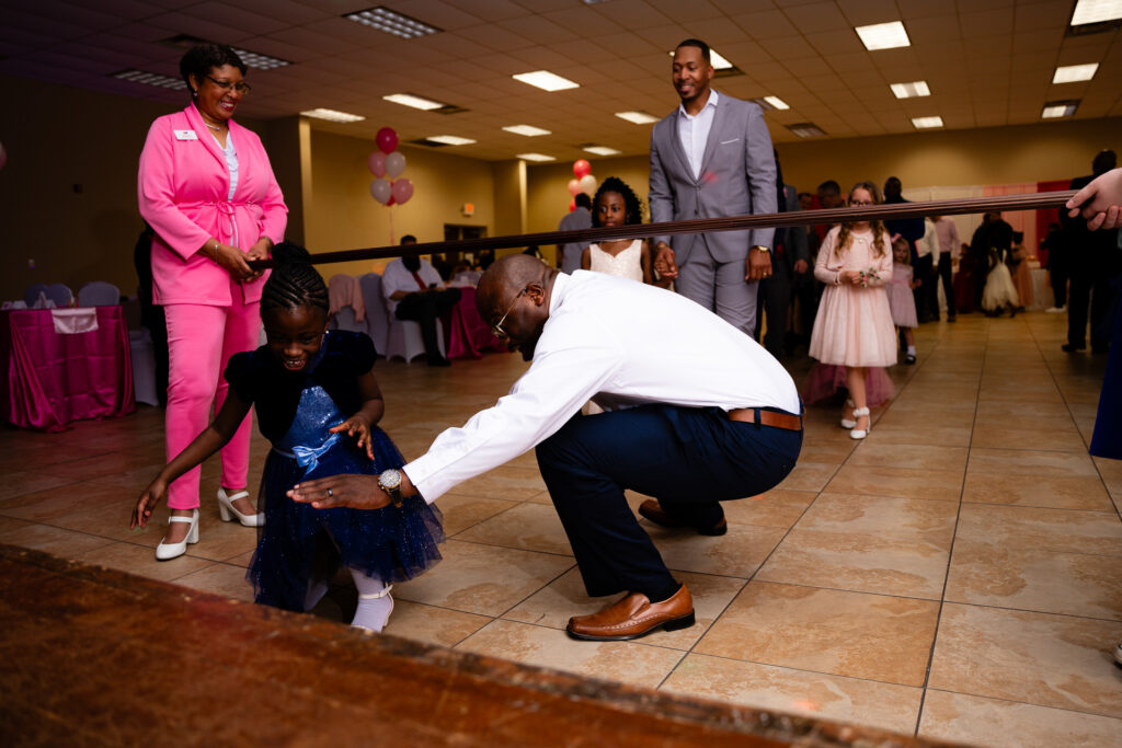 Heartwarming father-daughter dance capturing joyful moments at a special event.