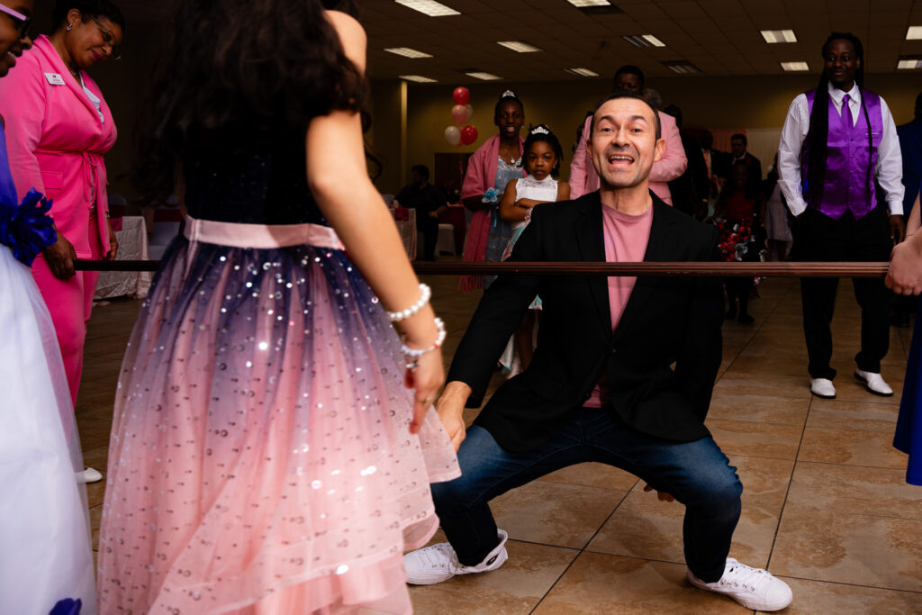 Heartwarming father-daughter dance captured in a joyful moment at a special event.