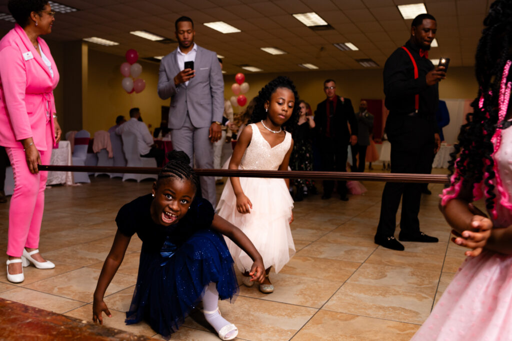 Father and daughter share a special moment at an unforgettable dance event.
