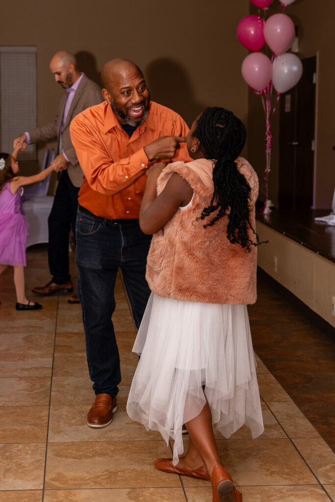 Heartwarming father-daughter dance capturing a cherished moment of love and celebration.